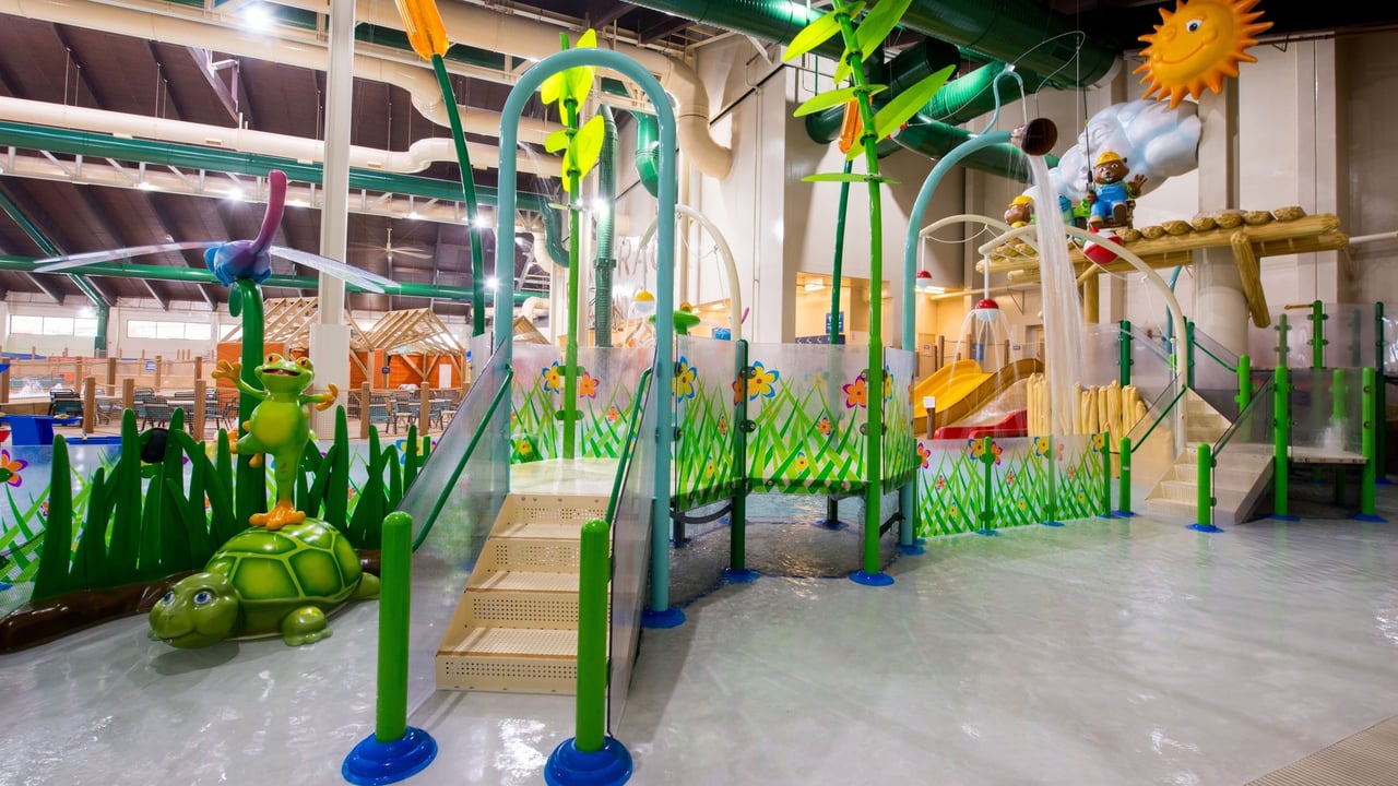 Indoor waterpark featuring colorful slides