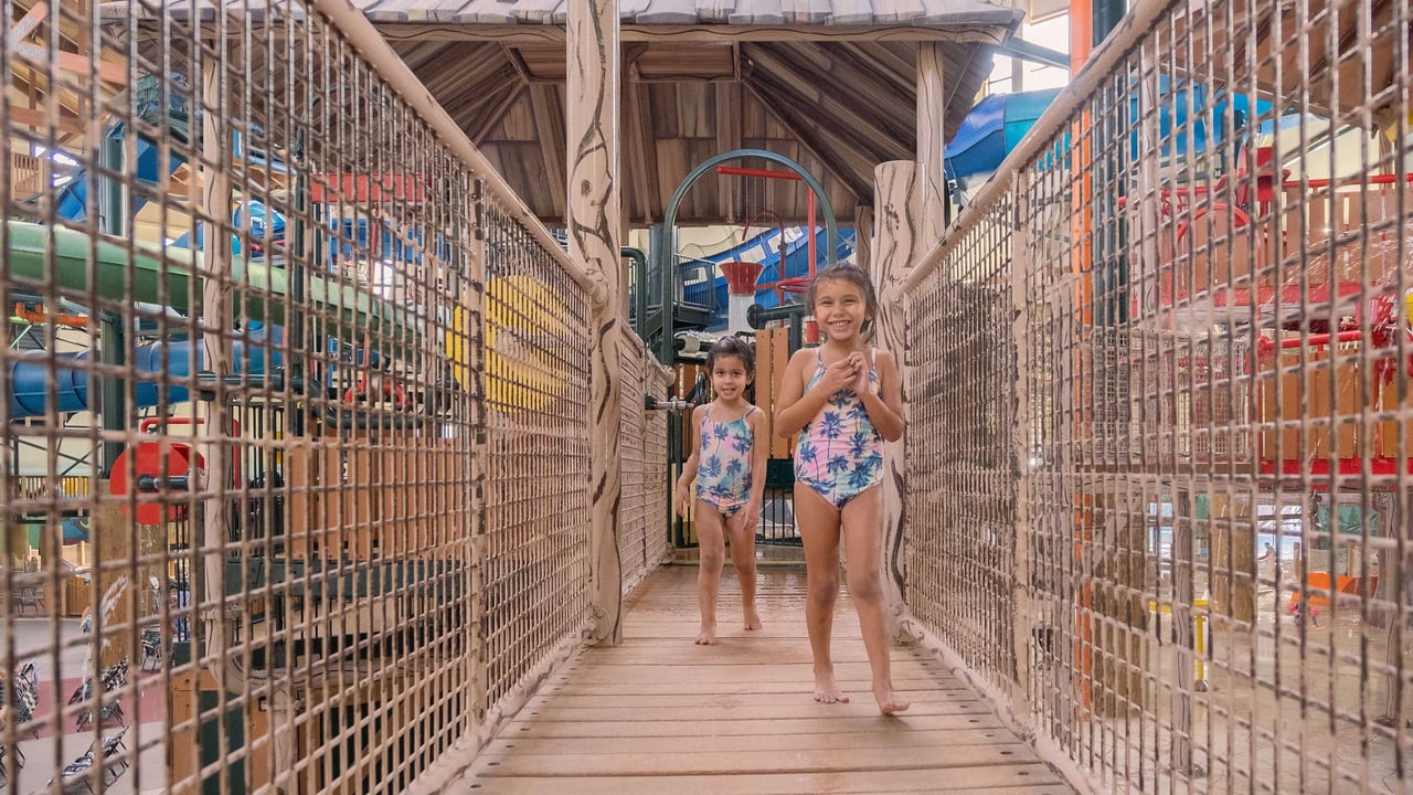 two kids walking on the Fort Mackenzie bridges