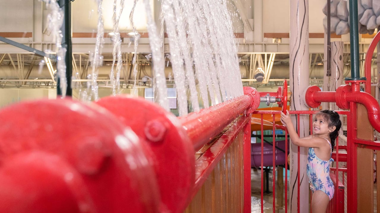 kid playing with water toys in the Fort Mackenzie Tower