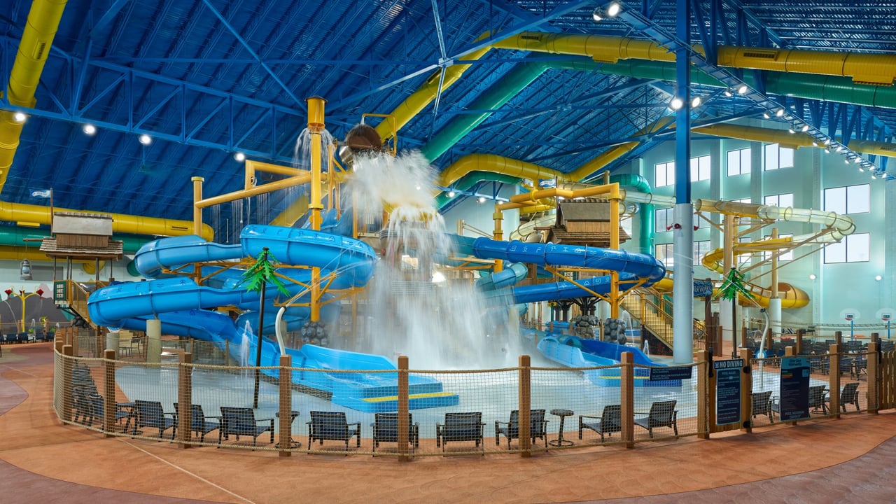 water pouring down from the bucket in a water tree fort