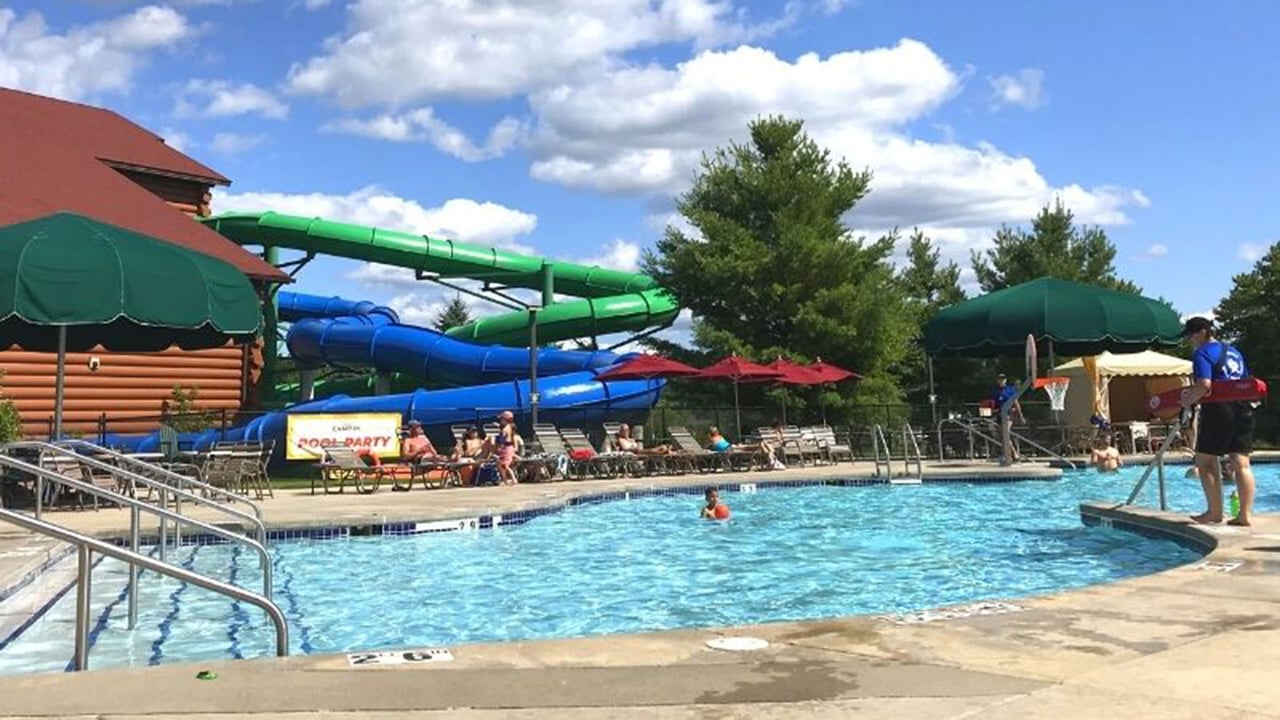 guests enjoying swimming outdoor during summer