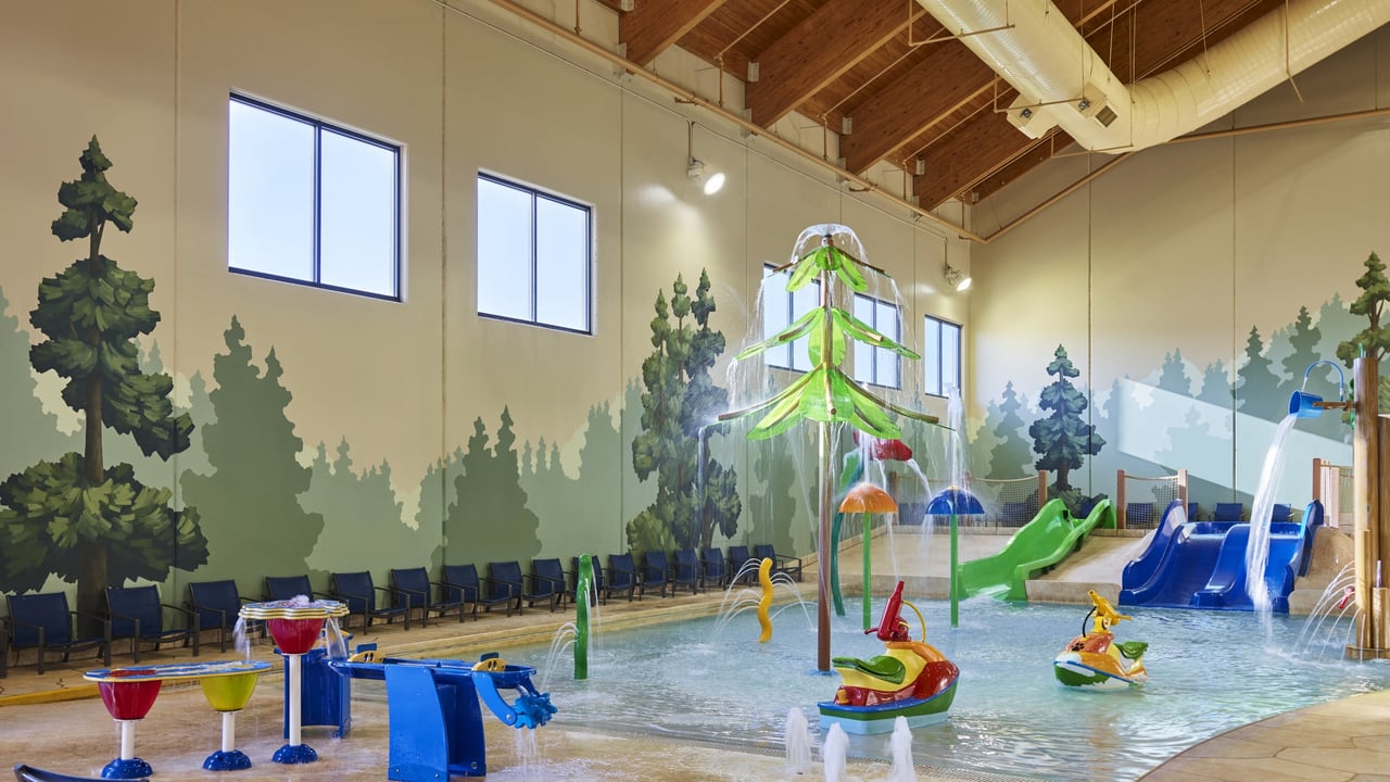 Multiple colorful slides in the indoor warterpark