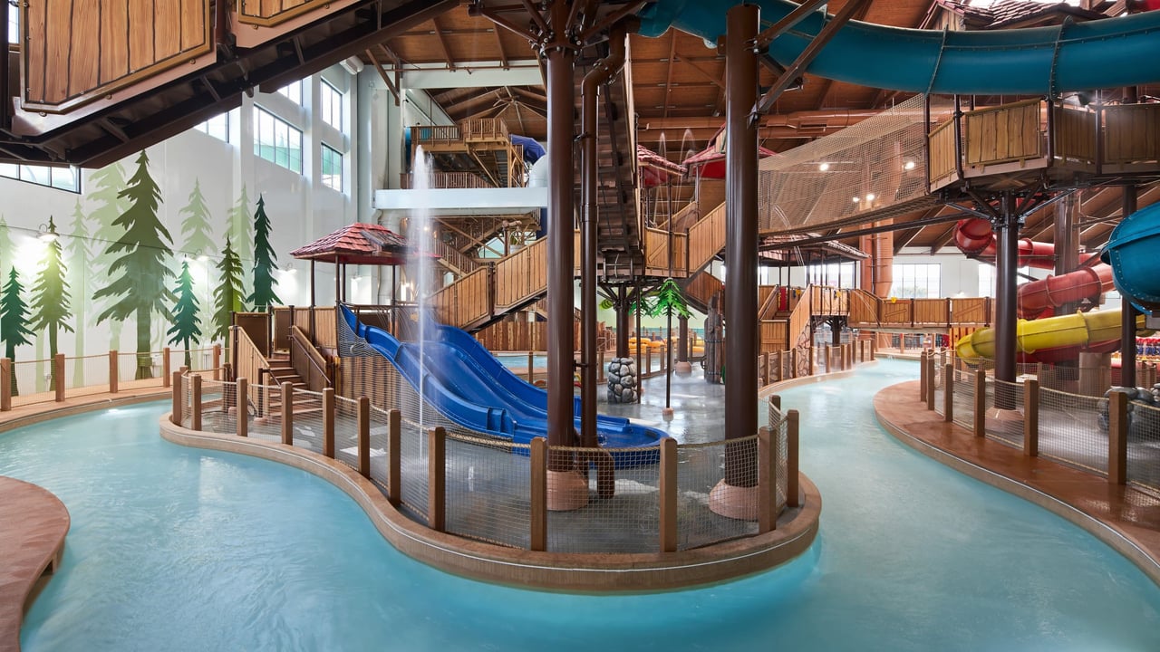 A vibrant water park featuring multiple colorful slides and attractions for visitors of all ages.