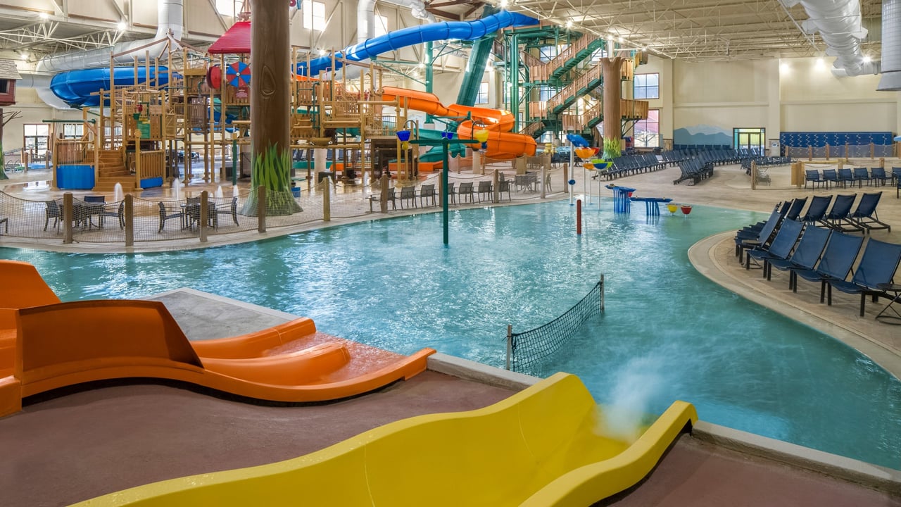 A vibrant water park featuring multiple colorful slides and attractions for visitors of all ages.