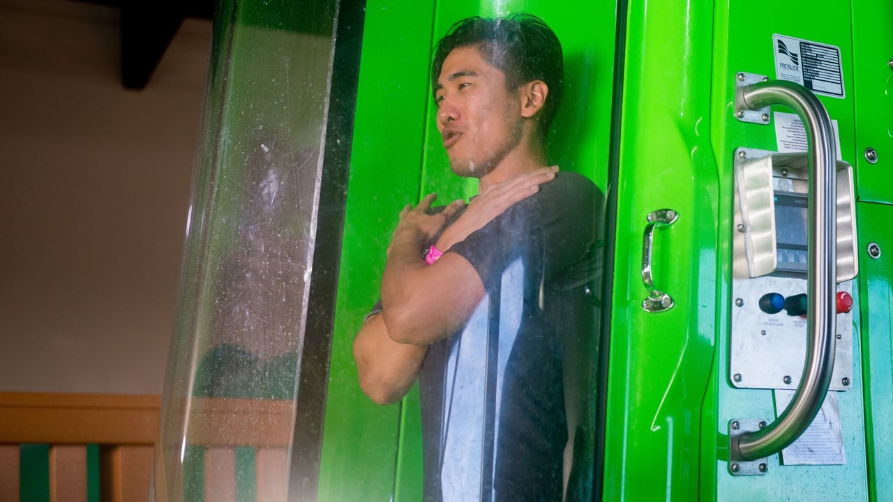 A man stands in the chute of the Wolf Tail trapdoor waterslide with his arms crossed waiting to take the plunge.