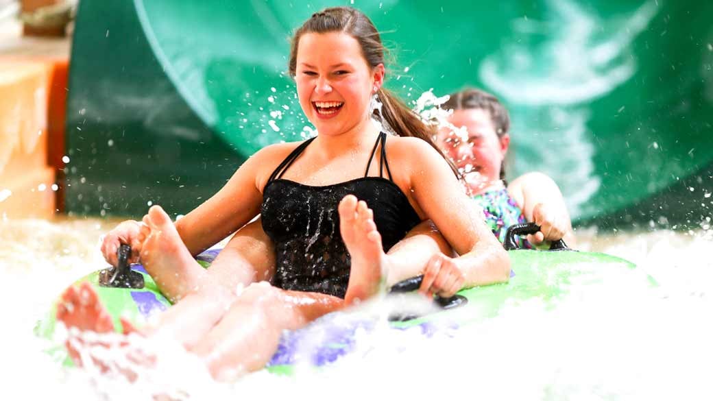 Two girls enjoying a water park
