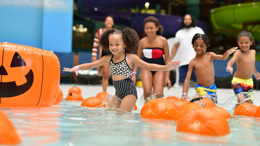 Kids having spooky fun in the indoor water park