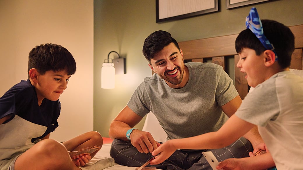 Father and sons in Great Wolf Lodge suite