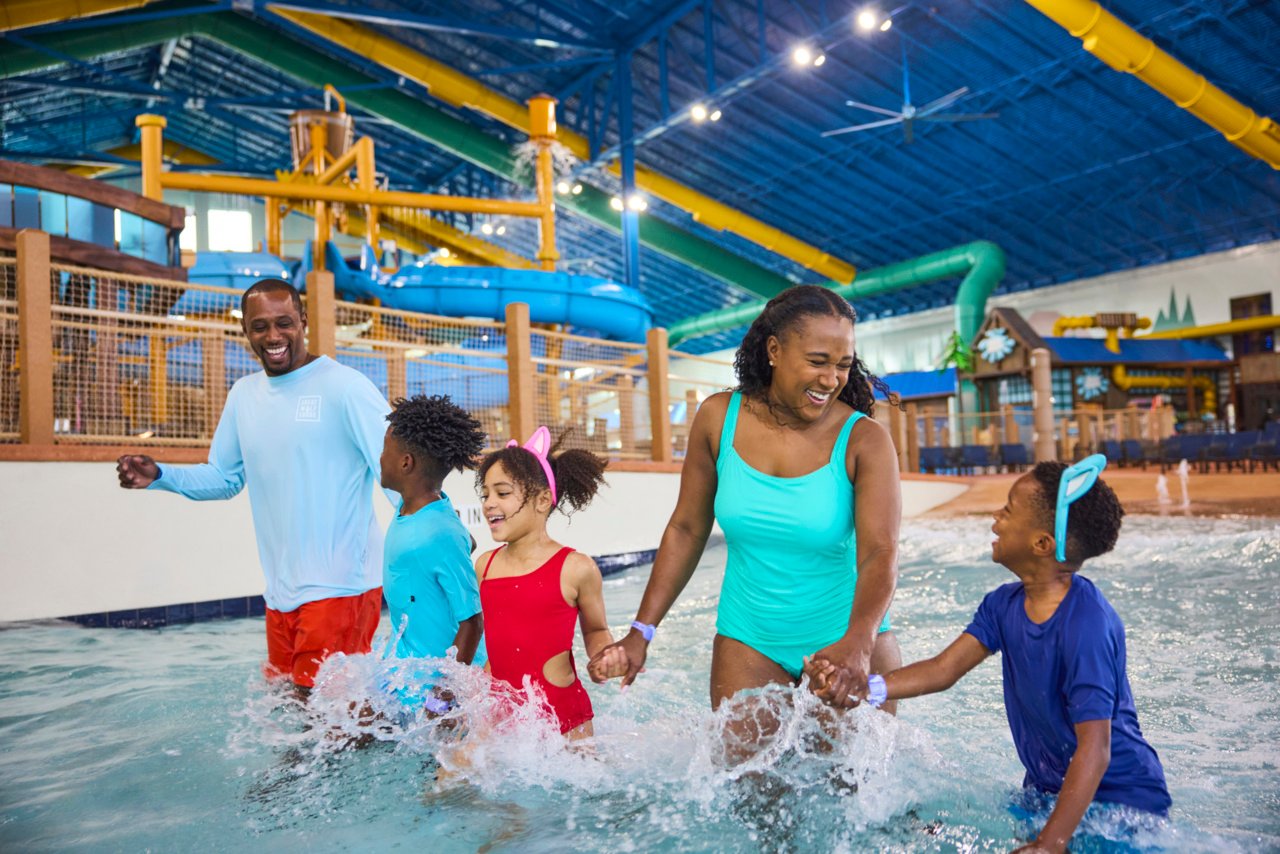 Family enjoying water rides at the Great Wolf Lodge