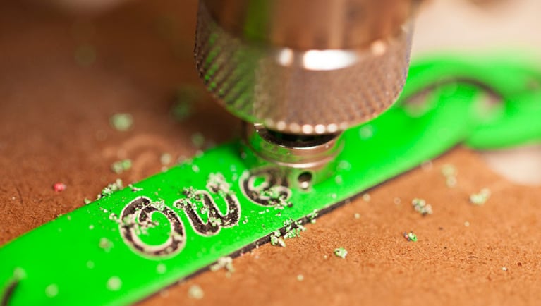 A name is engraved into a souvenir at Great Wolf Lodge indoor water park and resort.