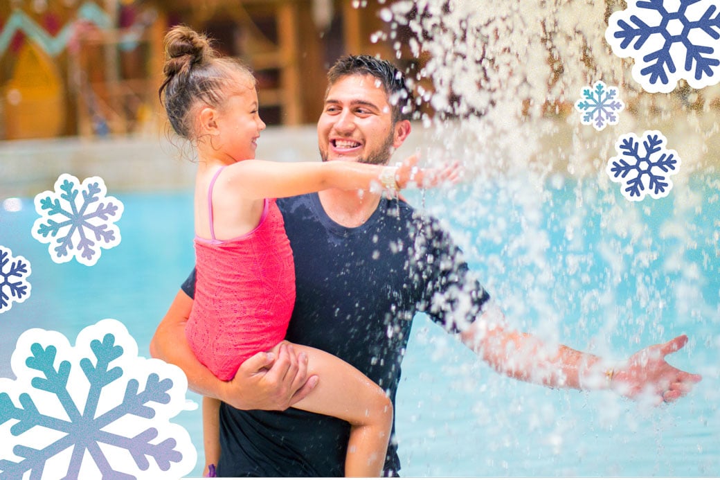Father and son enjoying in wave pool