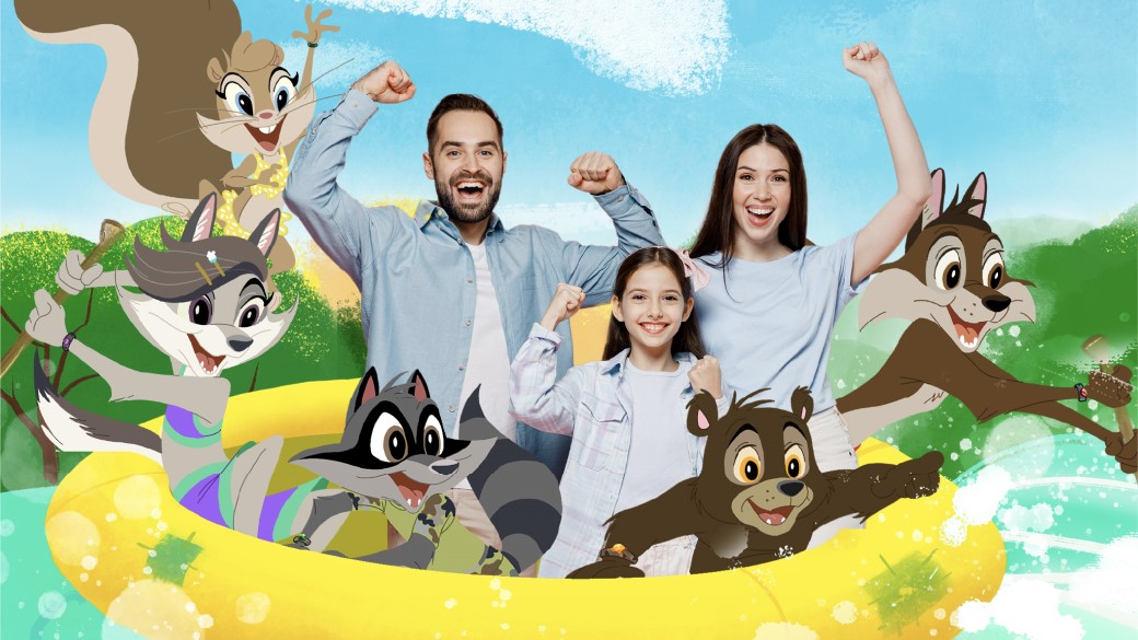 photo of family of four with great wolf lodge characters