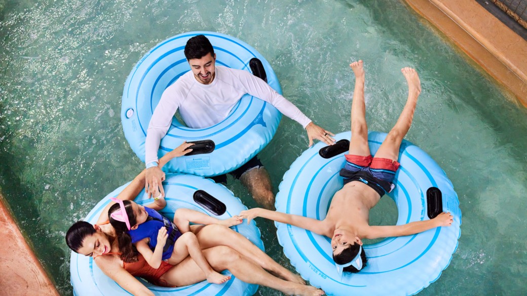 Family having fun together on a lazy river