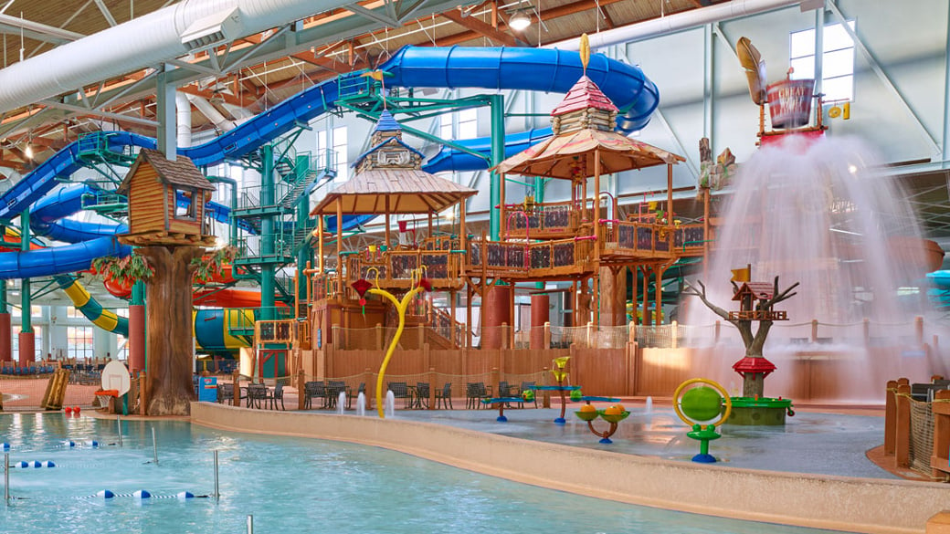https://www.greatwolf.com/cdn-cgi/image/fit=scale-down,width=1300/content/dam/greatwolf/sites/www/things-to-do/water-park/mackenzie-and-talking-stick-tree-house/waterparknew_1040x585.jpg