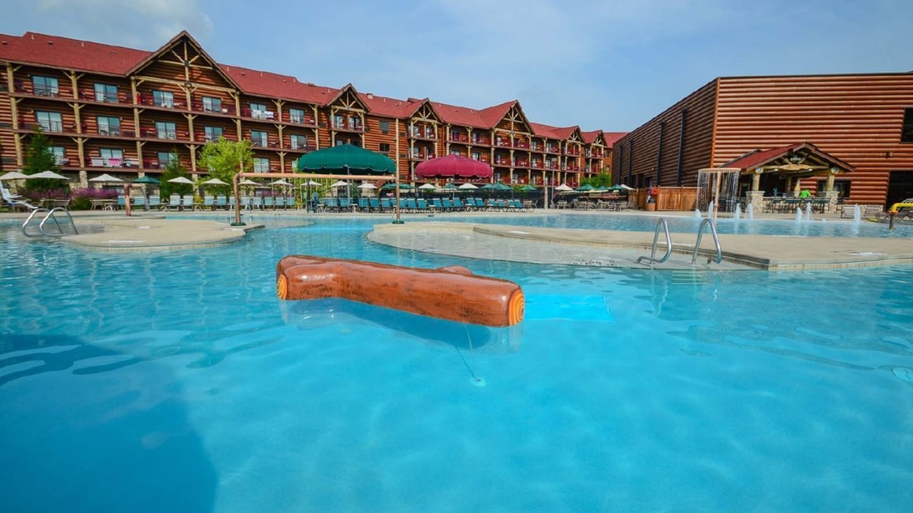 wood play structure in an outdoor pool