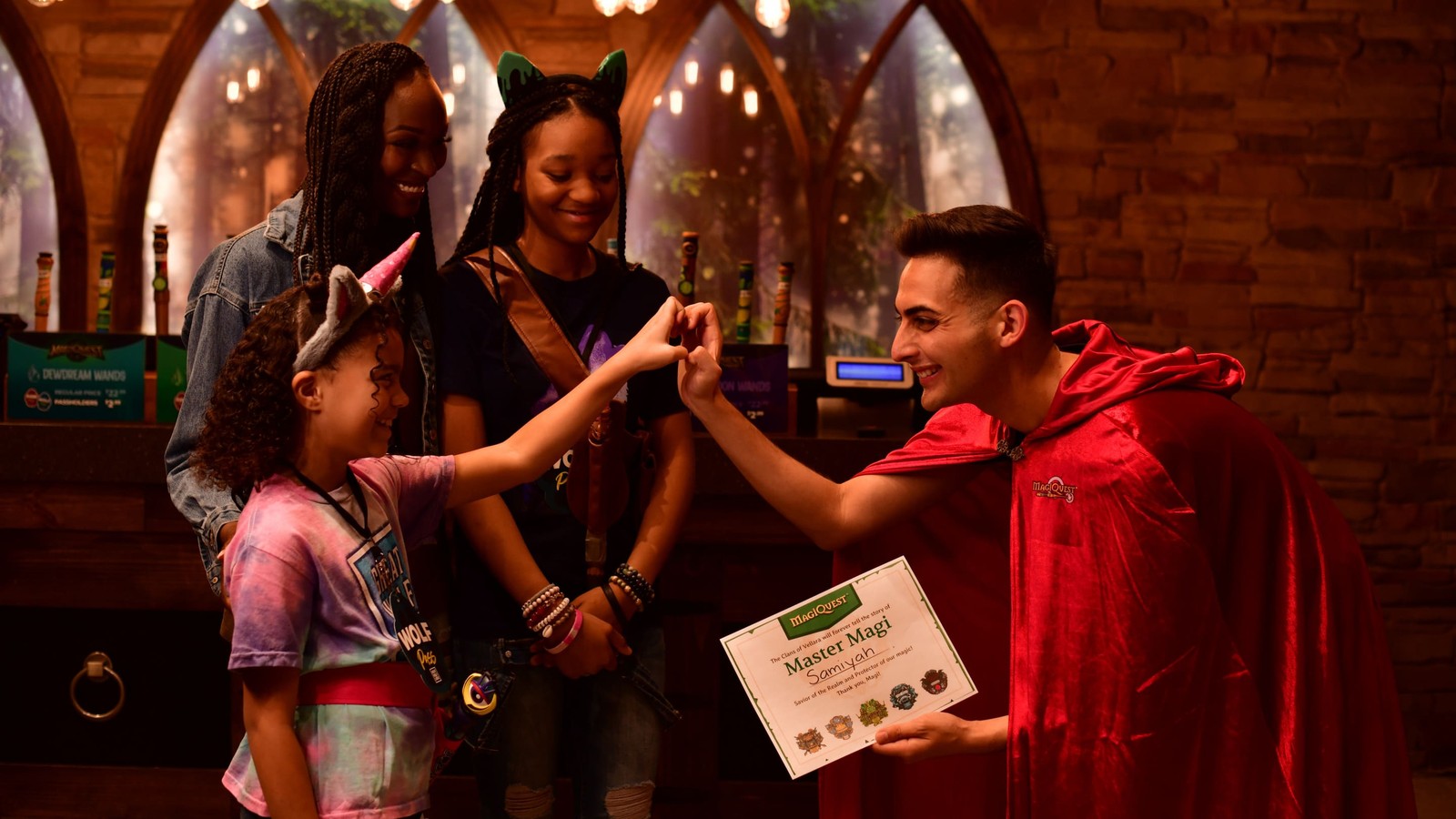 Girl receiving Master Magi certificate at Great Wolf Lodge