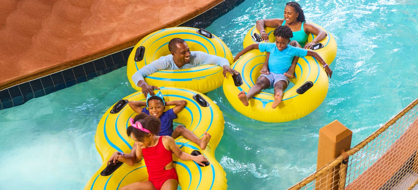 Family enjoying lazy river at Great Wolf Lodge