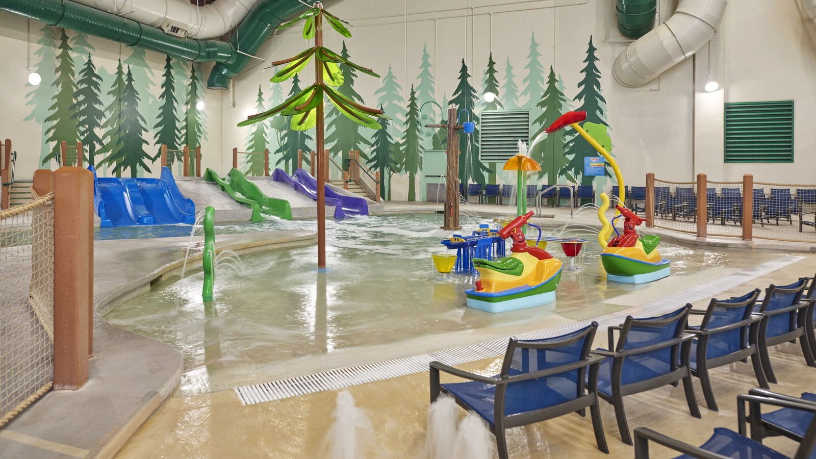 Vibrant water park featuring colorful slides and play areas designed for children.