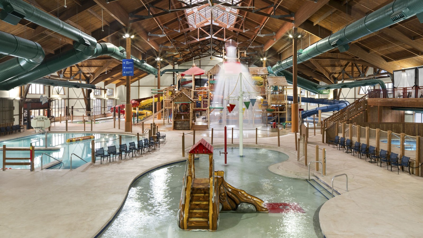 A vibrant water park featuring multiple colorful slides and attractions for visitors of all ages.