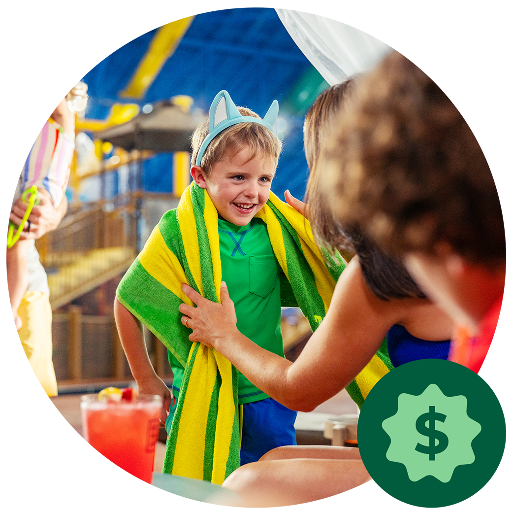 family standing under water and getting soaked