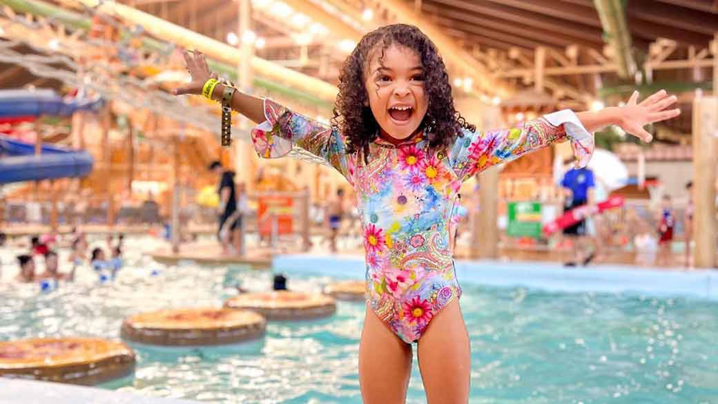 Little girl enjoying indoor waterpool