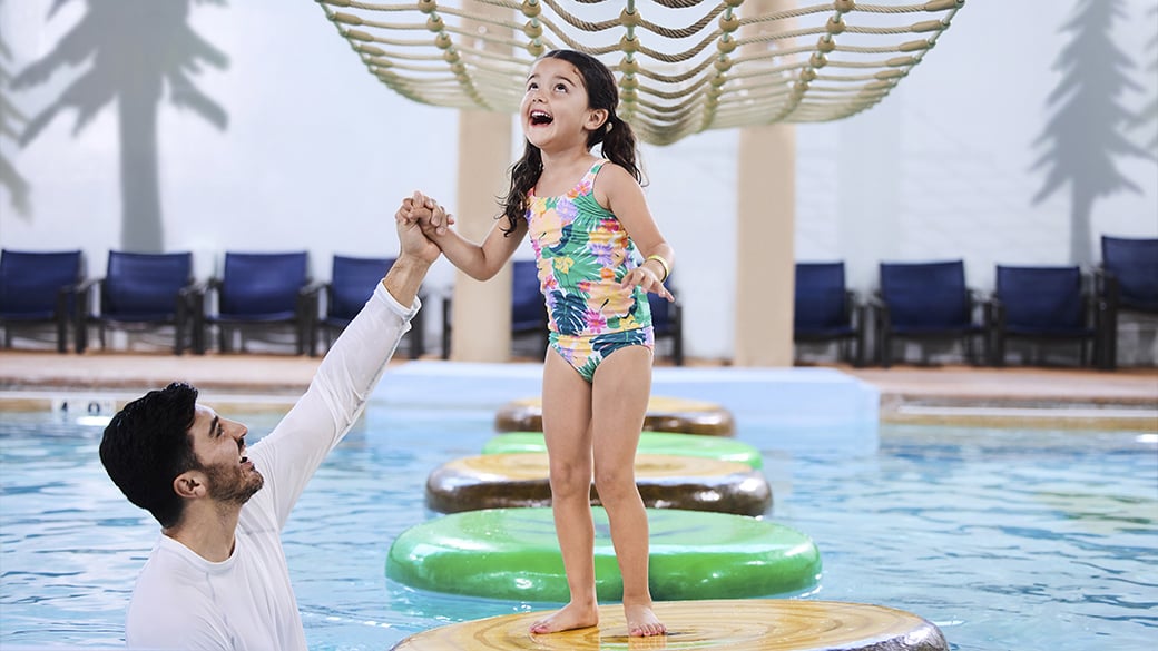 Little girl enjoying water park