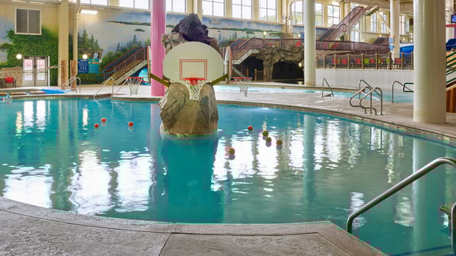 basketball hoop and balls in an indoor sports pool 