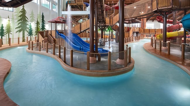 Family riding tubes enjoying the lazy river attraction