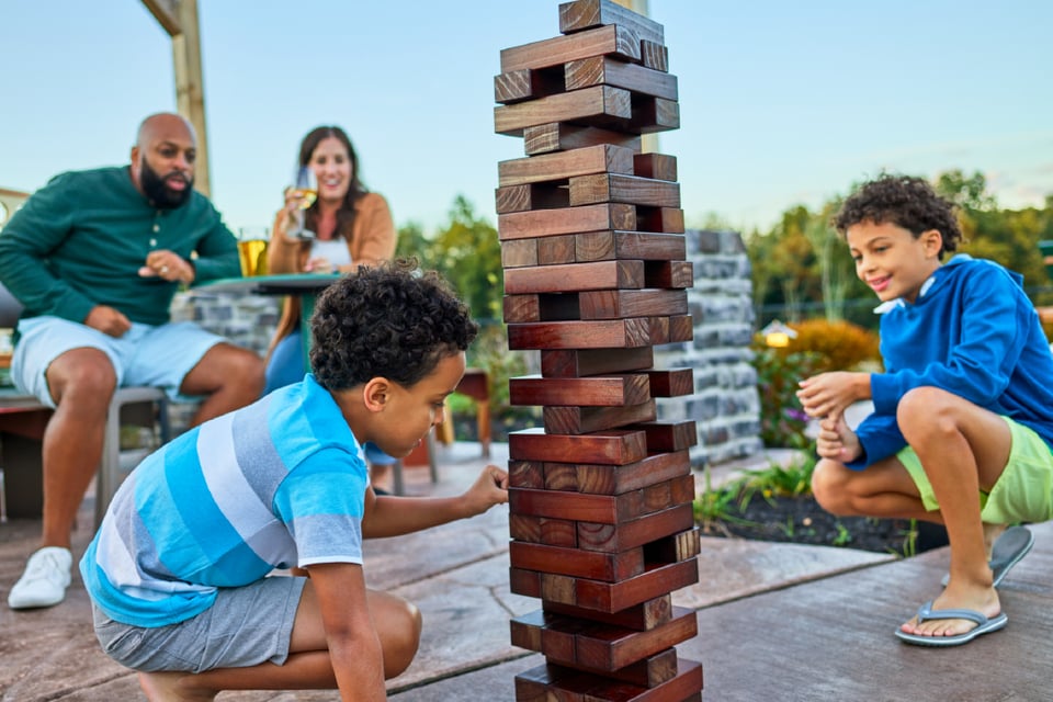 kids playing jenga