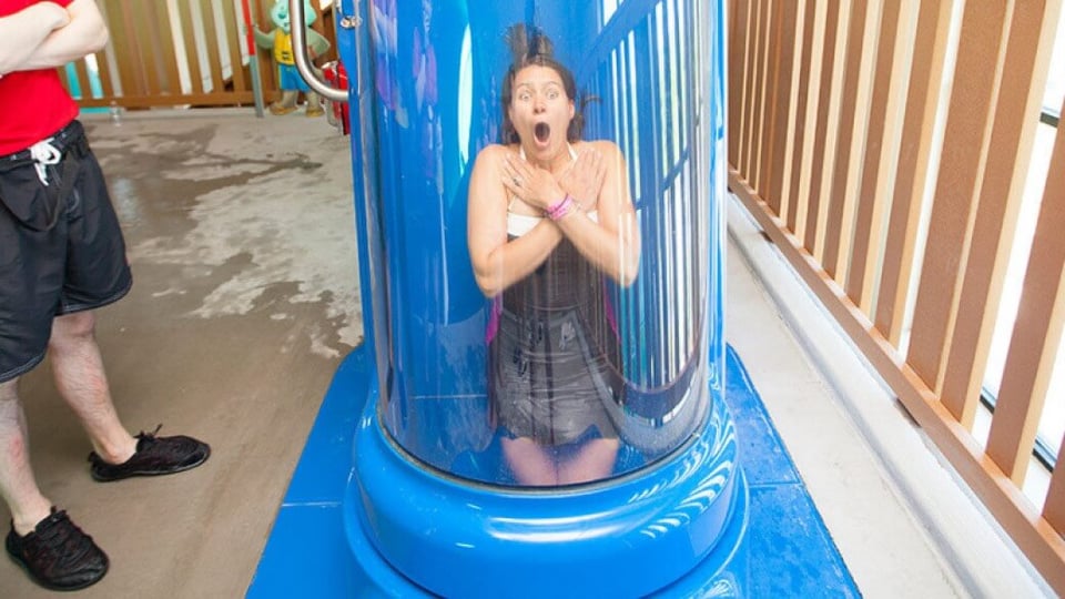 guest is riding a tube in wolf tail