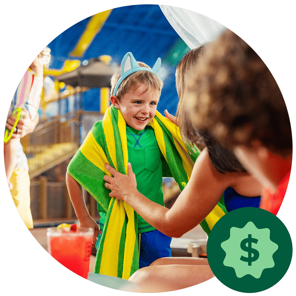 family standing under water and getting soaked