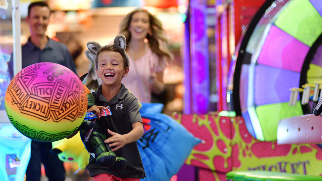 a family enjoying great wolf lodge attractions