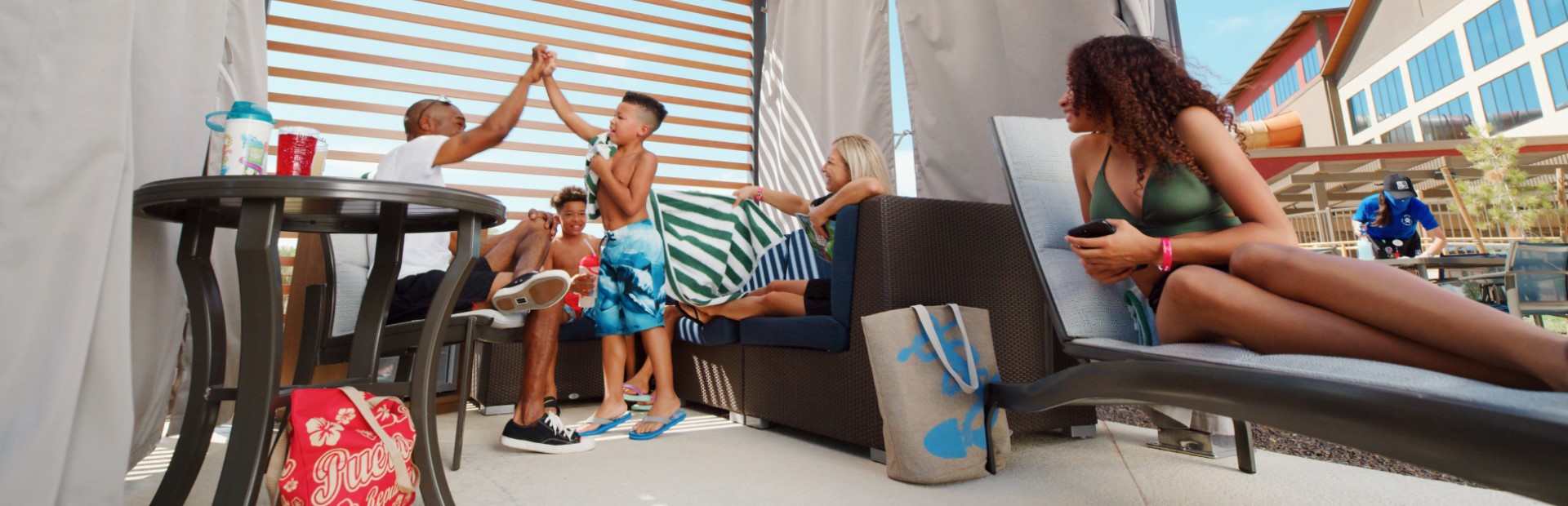 family enjoying in a cabana
