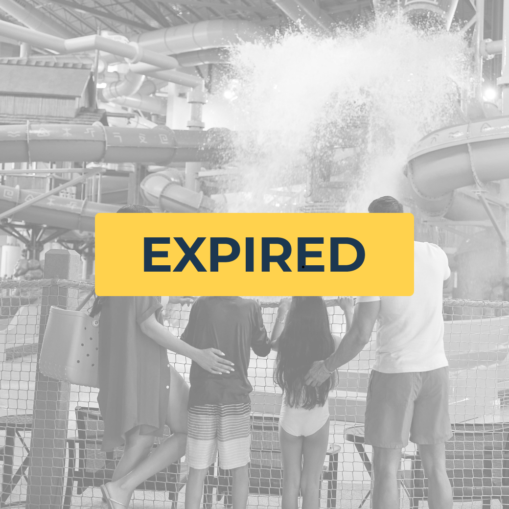 family looks at a bucket splashing water