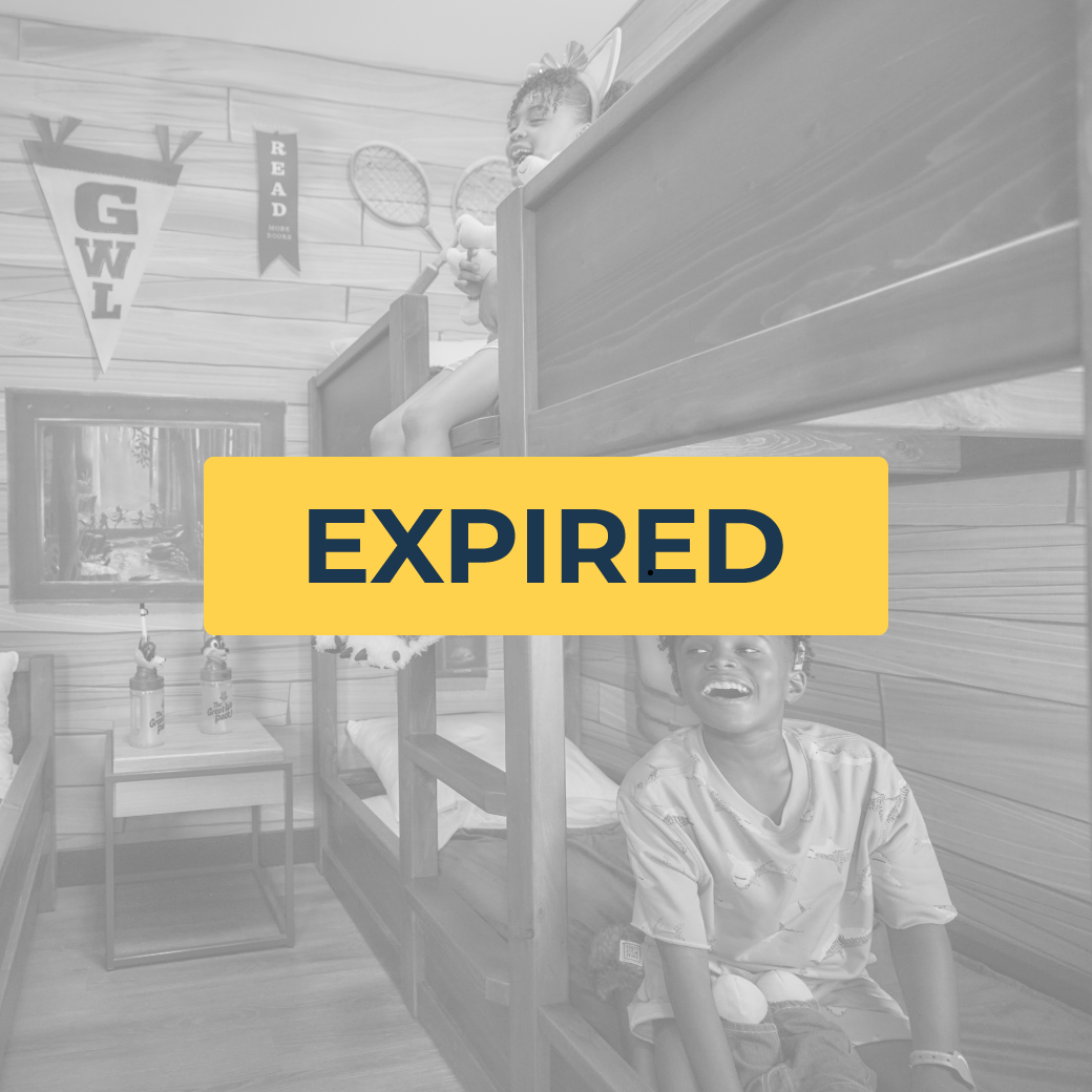 kids sitting on bunk beds in a theamed room