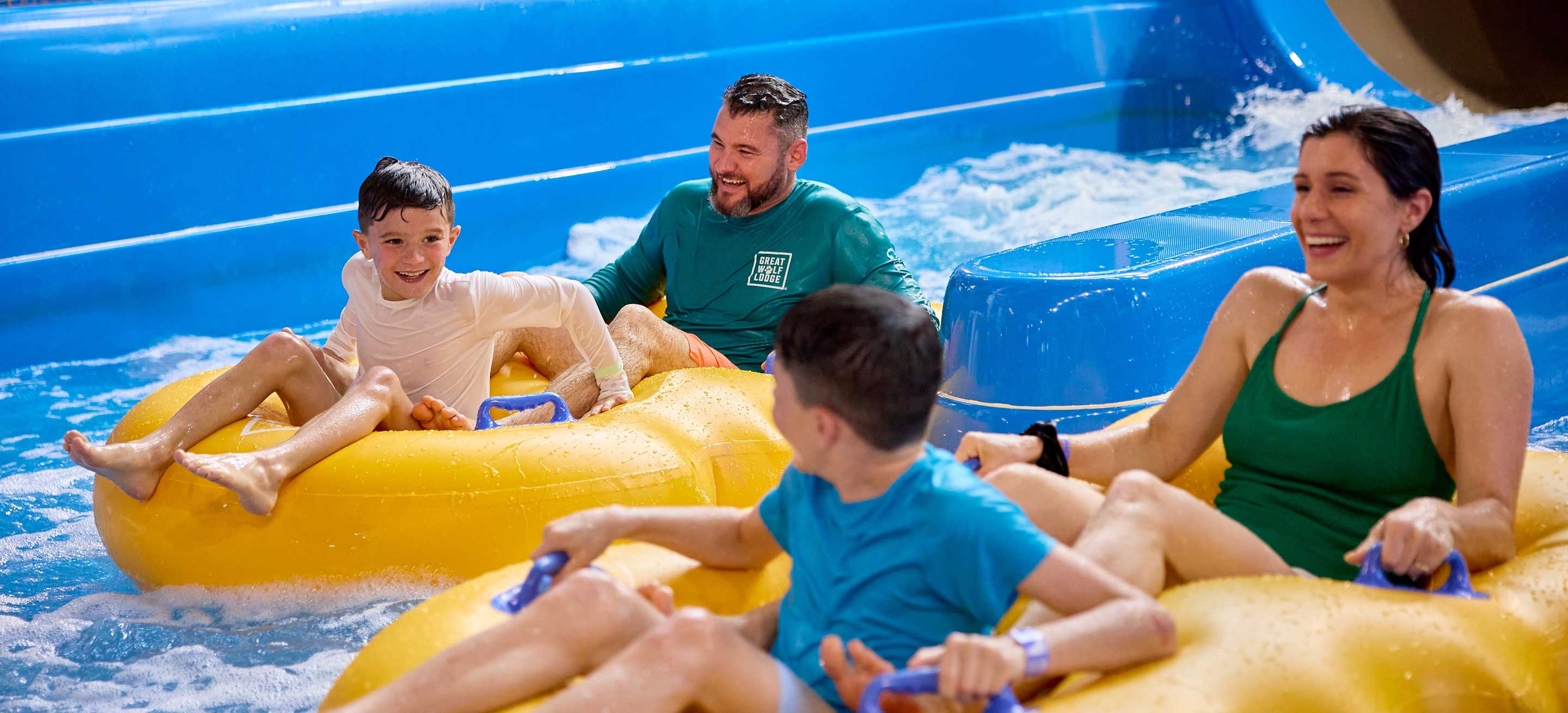 Family having fun on a water slide