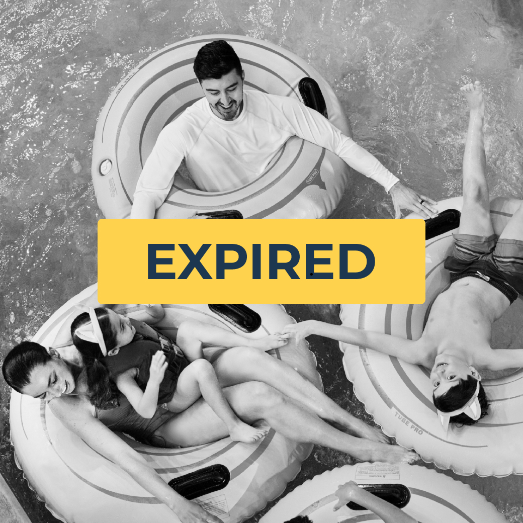 family enjoying the lazy river riding tubes