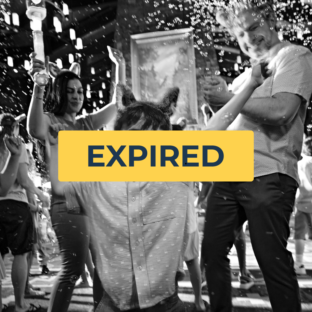 kid dancing in a dance party as mother and father enjoy with him