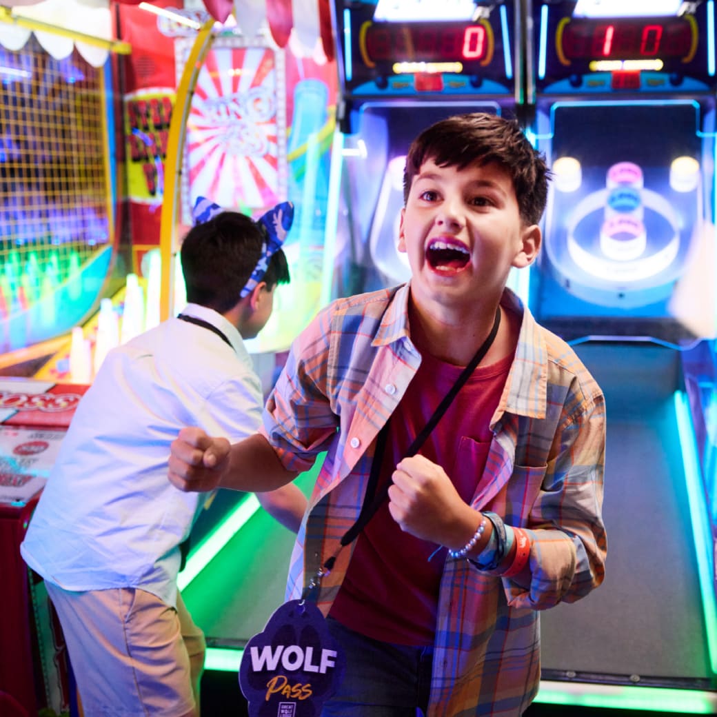 kids is joyed after wining at the arcade