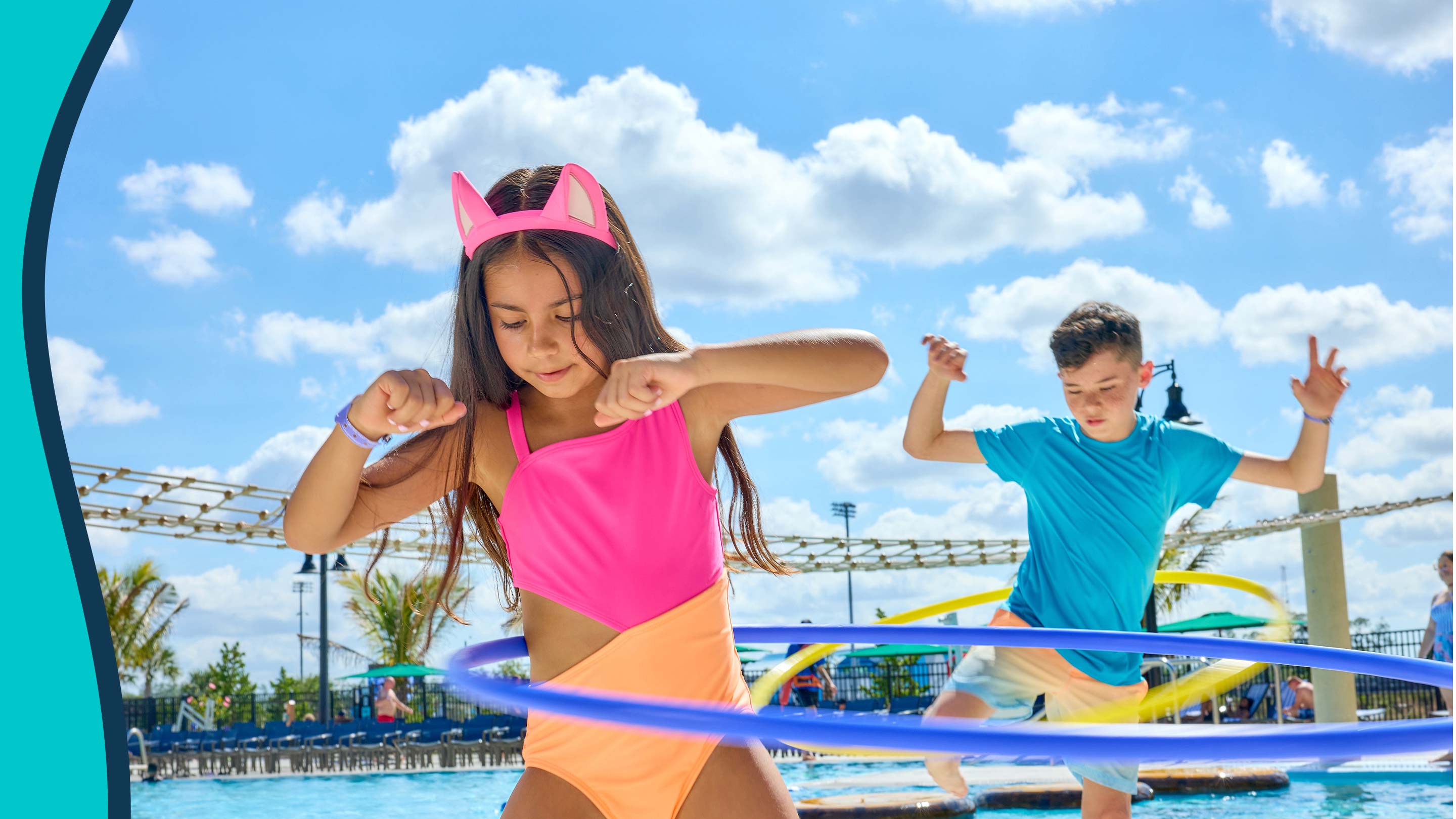 kids playing in an outdoor pool