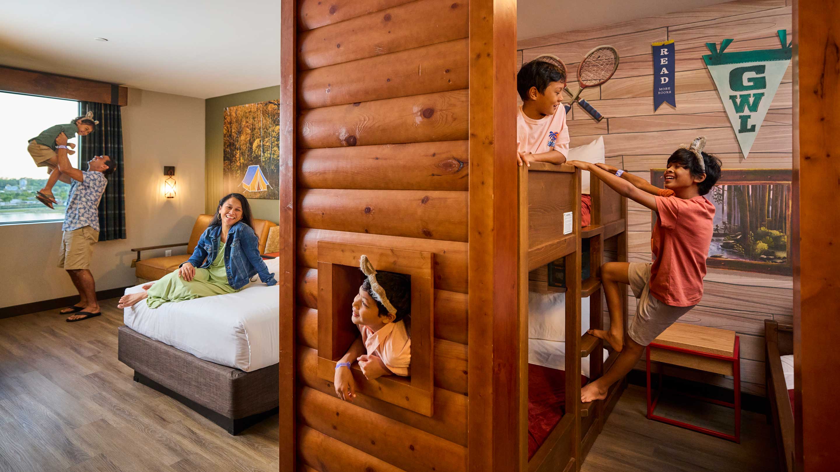 family of 6 enjoying in a themed suite.