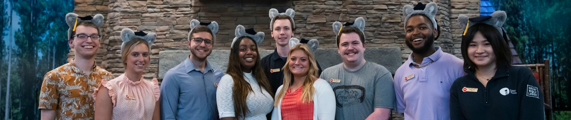 attendees of the program wearing wolf ears in the grand lobby