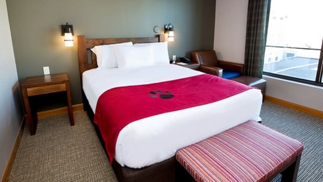 The queen bed in the Queen Cabin Suite