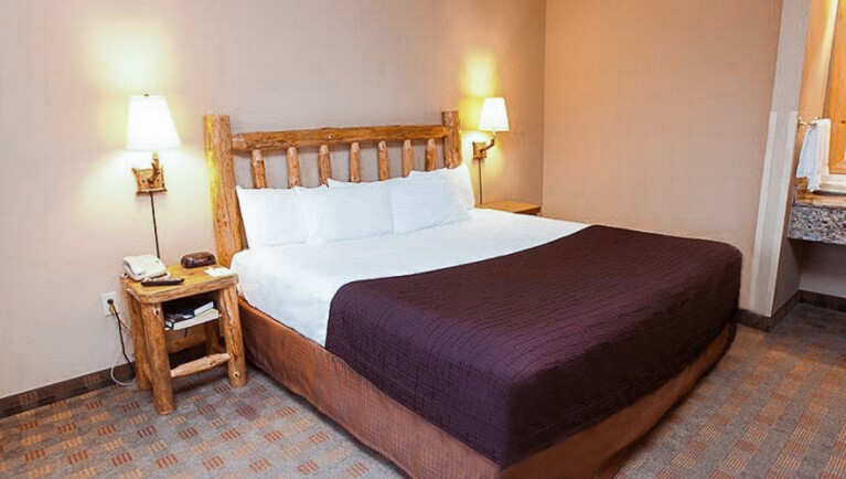 The king bed in the Grand Bear Suite