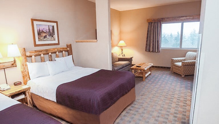 The bed in the Majestic Bear Suite