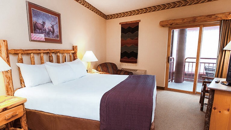 The king bed in the Majestic Bear Suite