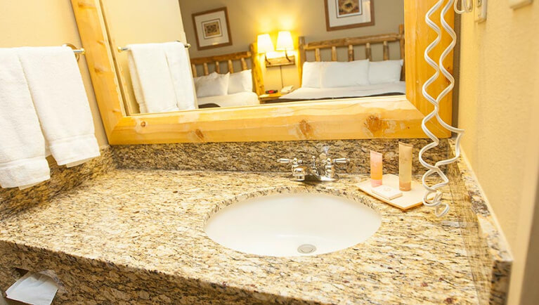 The bathroom sink Luxury King Suite
