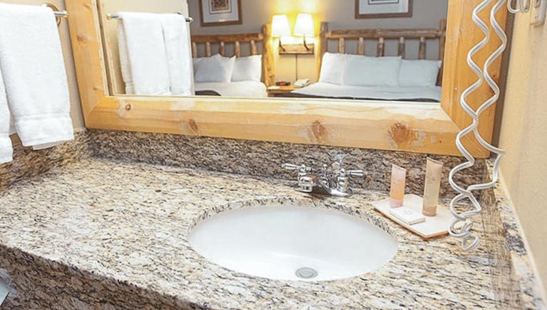 The bathroom sink Luxury King Suite