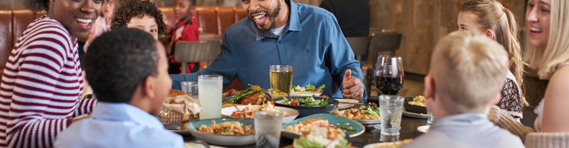 a family enjoying food at the great wolf lodge dining outlet