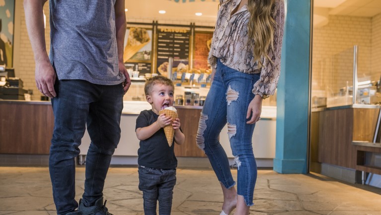 A toddler enjoying  Ben & Jerry's ice cream 